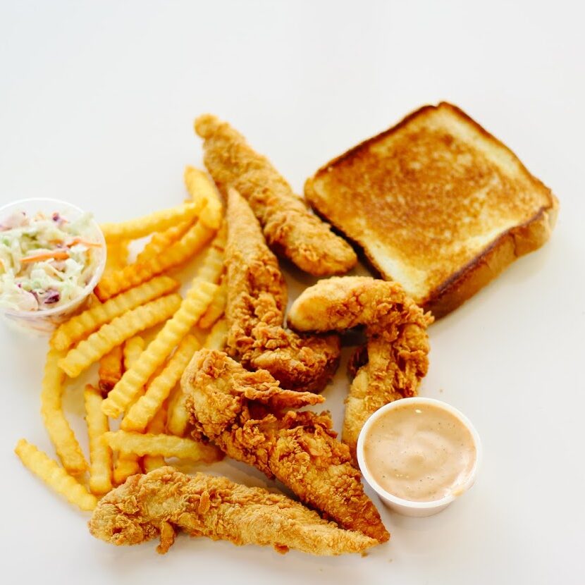 Mr Charlie's chicken tenders meal that includes tender, fries, toast, sauce and coleslaw
